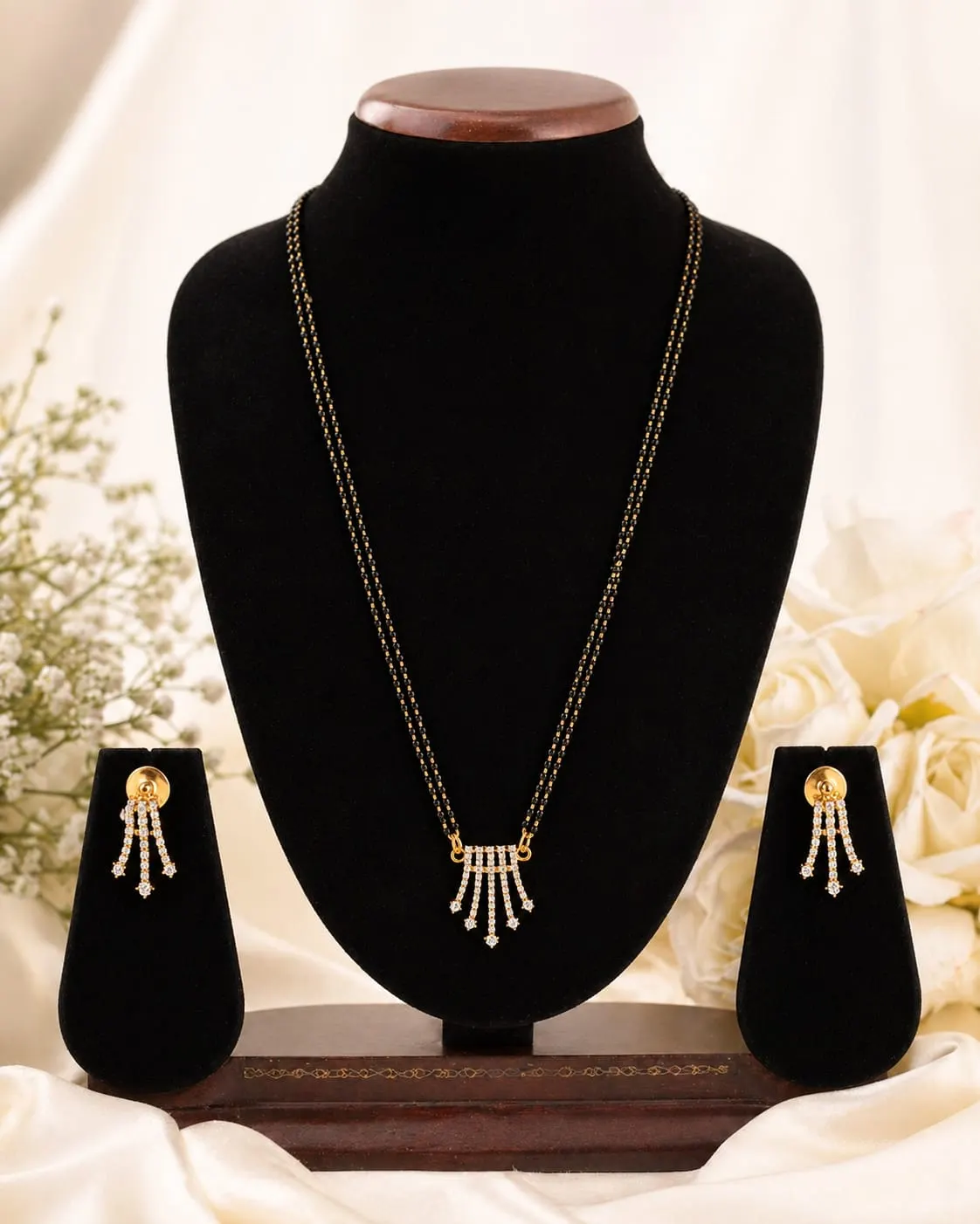 Dipra Luxe AD Tassel Mangalsutra Set with Earrings for Women (Gold Plated, Double Black Bead Chain) - product image 4